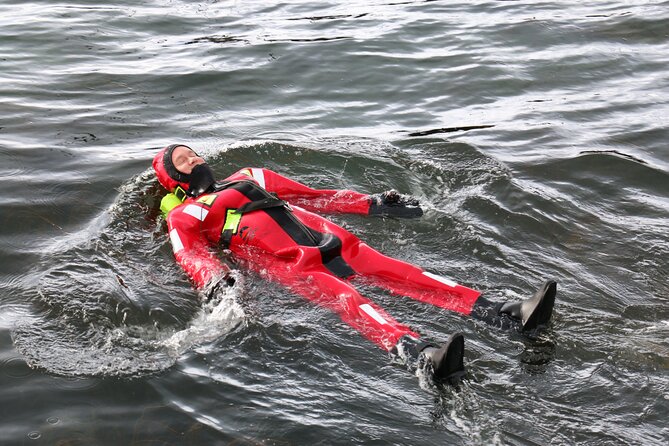 3-Hour Shared Arctic Morning Floating Experience in Norway - Getting into the rescue suit