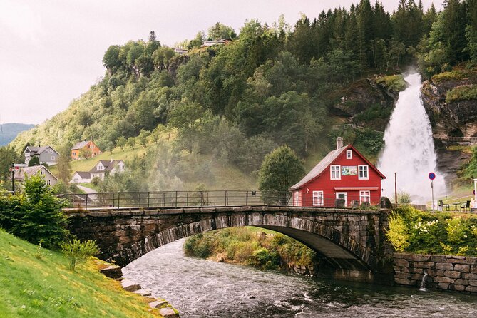 Bergen in a day, Guided tour: Old Town, Waterfalls & Waffles - Fossen Bratte begins the day with a mountain waterfall