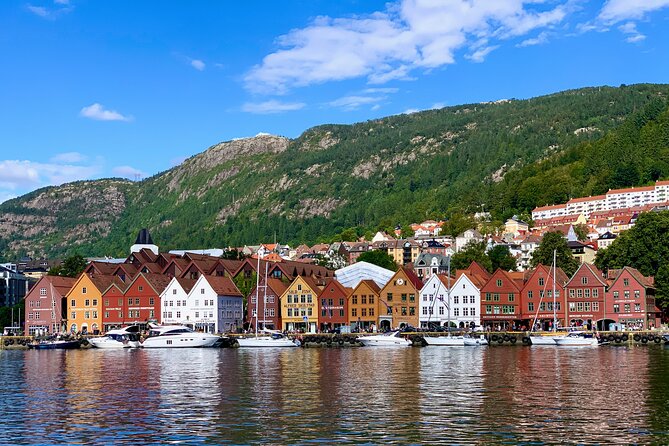 Bergen in a day, Guided tour: Old Town, Waterfalls & Waffles - Bryggen closes the loop in Bergen