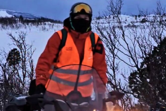 Driving Ski-Doo Snowmobile Adventure 5 Hours Photos included - Getting suited up in Arctic gear