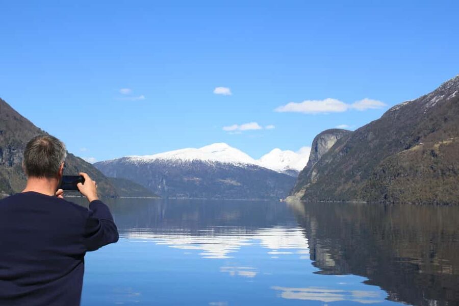 From Geiranger: Geiranger Fjord Tour with Stop in Hellesylt - The Friaren waterfall water tasting