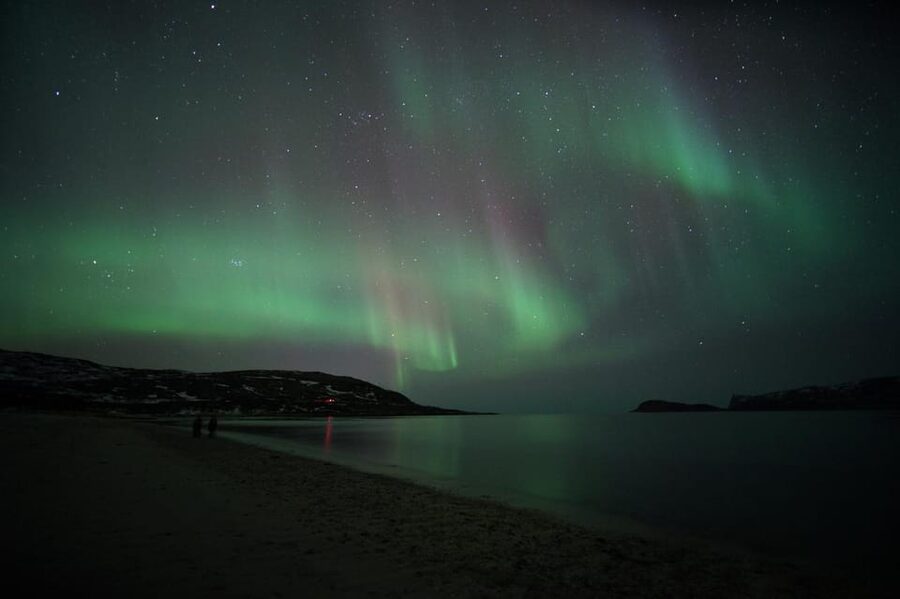 From Tromsø: Aurora Bus Tour with Snacks, Photos, and Drinks - Thermal suits, hot drinks, and snacks