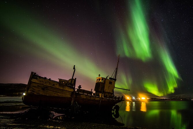 Full Night Magic of the Northern Lights in Tromso - Waiting outside, with fire, coffee, and snacks
