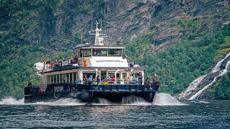 Geiranger: Fjord and Waterfalls Sightseeing Boat Trip - Leaving Geiranger Harbor behind
