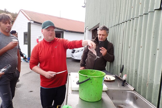 Half Day Fishing and Outdoor Cooking in Bergen - Cooking the catch in the sea house