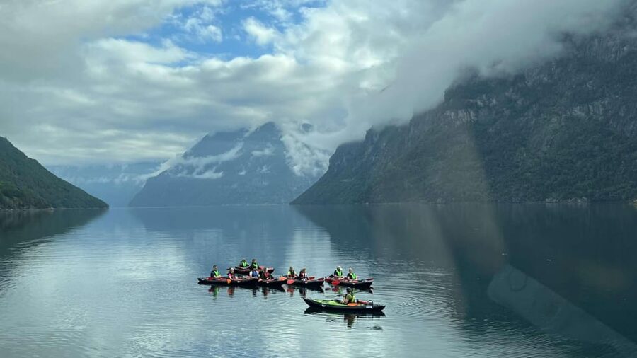 Hellesylt: Beginner-Friendly Fjord Kayaking Experience - Following the shoreline beneath Hellesylt’s mountains