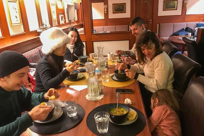 Luxury Northern Lights Yacht Cruise with Hot Tub from Tromsø - Captain Kenneth and Sachi set the tone