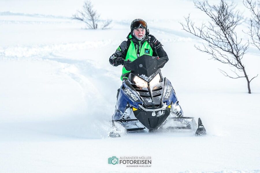 Lyngen: Snowmobile Safari with Lunch in seaside Restaurant - Getting fitted for Arctic conditions