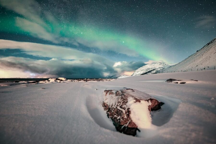 Lyngenalps: Northern Lights Snowmobile Safari - Setting out from XLyngen by the sea