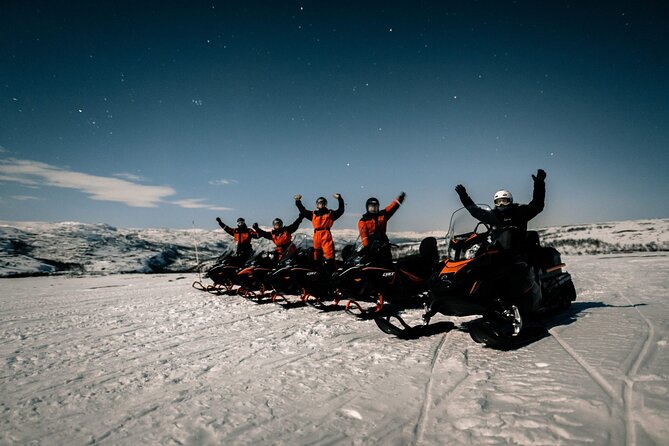 Northern Lights Adventure By Snowmobile - Riding the old postal road toward Beskades