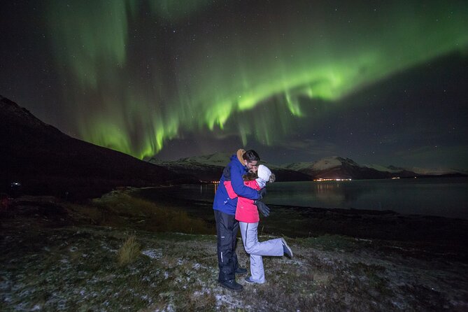 Northern Lights Big Bus Chase with Free Photos - Waiting beside a fire in the snow