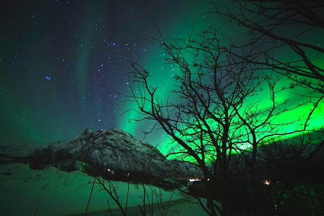 Northern lights - TeslaX Ecofriendly Car - The first stop: leaving Tromsø behind