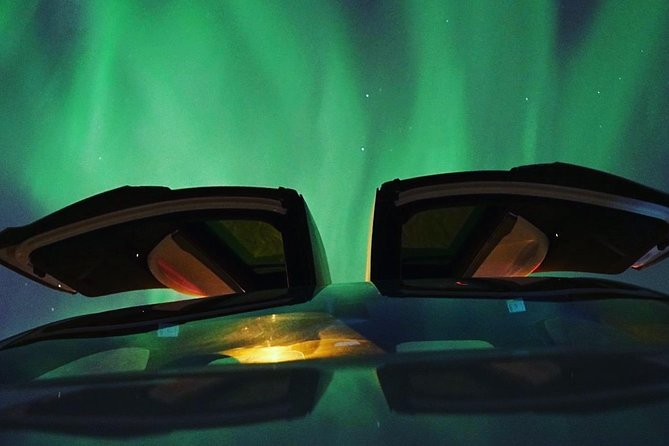 Northern lights - TeslaX Ecofriendly Car - Finding an opening in the cloud cover