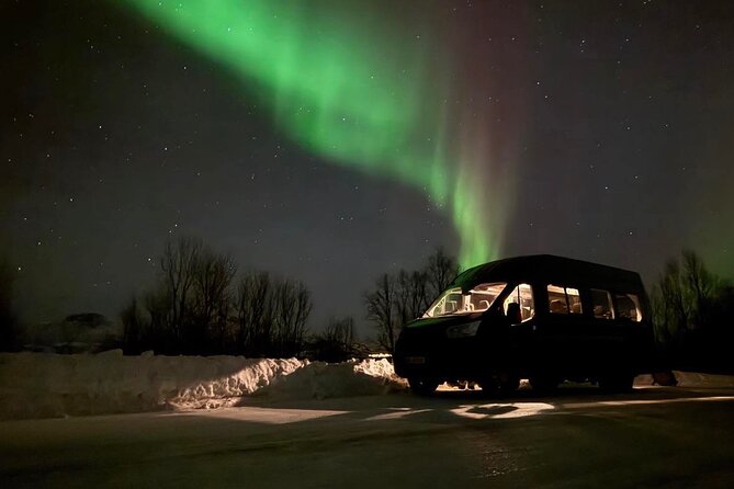 Northern Lights Tour with Hot Food and Drinks in Tromso - Chasing clear skies beyond the city