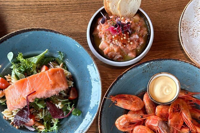 Oslo Highlights and Delights Tour with Salmon Tasting Lunch - Oslo Opera House And The Waterfront