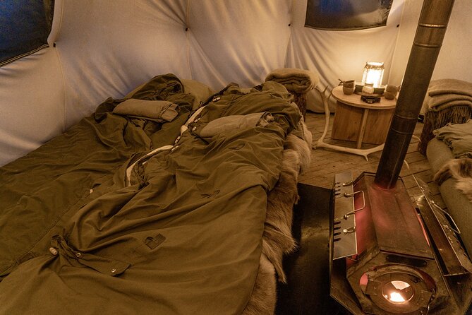 Overnight Stay with Reindeer Sledding & Feeding - A Sami meal beside the fire