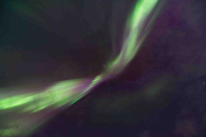Private Aurora Hunting with Professional Photographer from Alta - Bonfire, thermal suits, and food in the cold