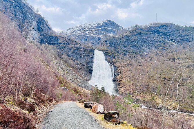 Private Guided Tour of Bergen and the Best of Norwegian Fjords - Walking Behind Steinsdalsfossen Waterfall