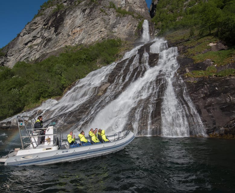 RIB Geiranger - Fjordsafari - Looking up at Skagefla mountain farm
