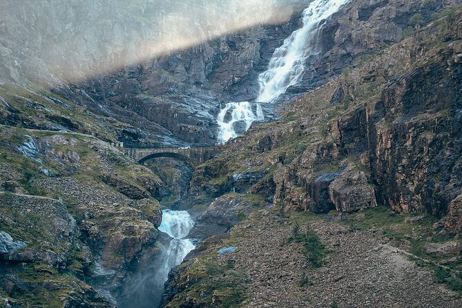 Sightseeing Tour in Trollstigen - Land of Trolls - The 11 hairpins and the mountain road warning