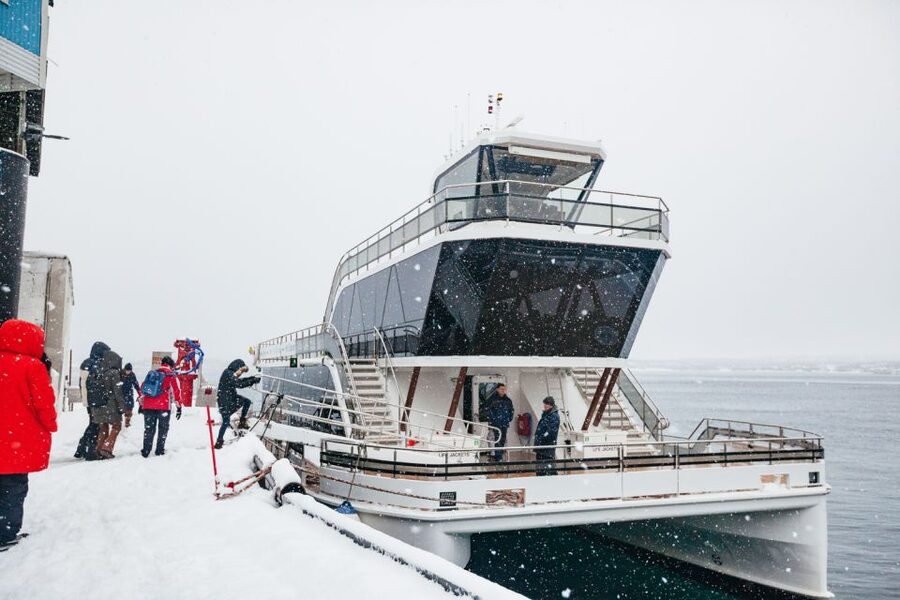 Tromsø: Arctic Fjord Cruise With Stop On Land At Fish Racks - Warm cabins, coffee, and food onboard