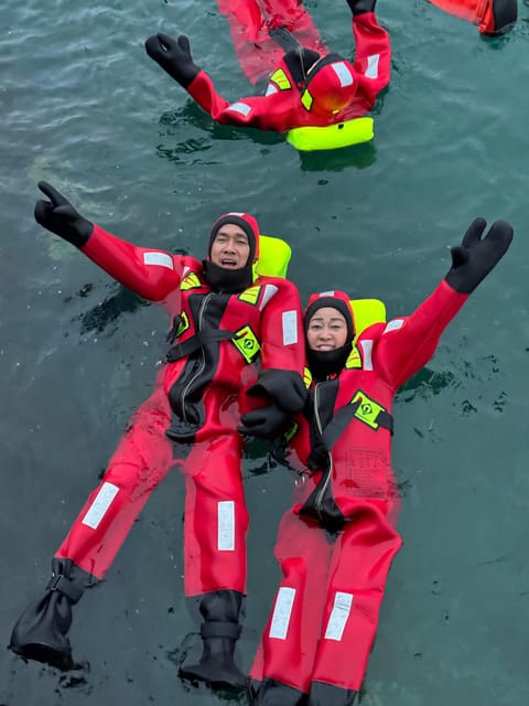 Tromsø: Arctic Fjord Floating in Survival Suit - From Magic Ice Bar Tromsø to Kaldfjord