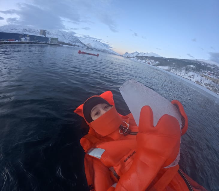 Tromsø: Arctic Fjord Floating in Survival Suit - Getting into the Arctic water