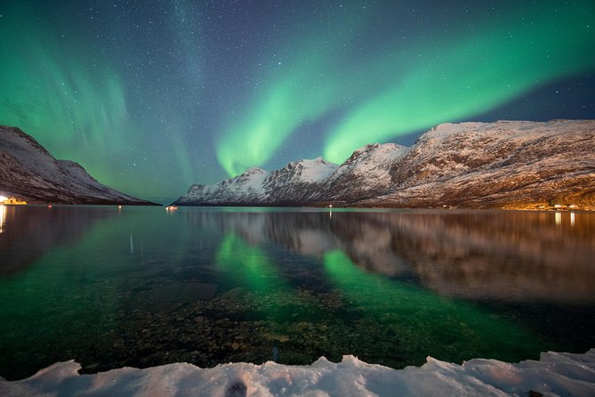 Tromso Aurora Chase by Minibus with Thermal Suit, Snack and Photo - Warmth, food, and waiting outside