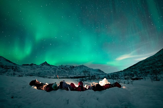 Tromso Aurora Hunt with Bonfire, Soup, Winter Gear & Transfers - Starting in central Tromsø and heading into the dark