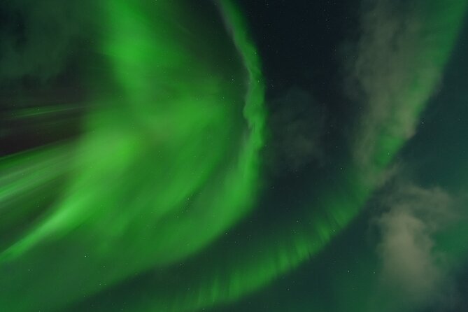 Tromsø: English/Spanish Aurora Pathfinder Tour with Photos - Thermal suits help, but your own clothing still matters