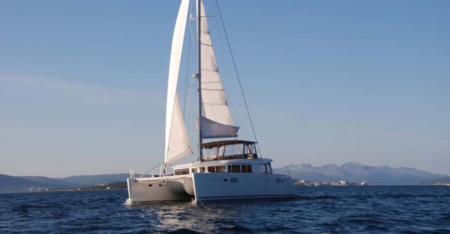 Tromsø: Fjord and Islands Luxury Catamaran Cruise - The deck, the cold, and the best viewing strategy