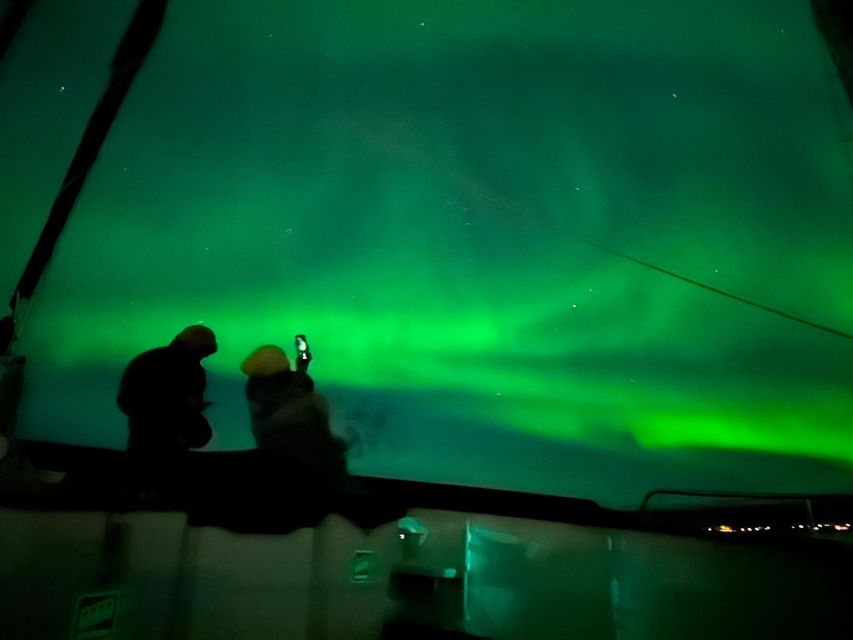 Tromso: Luxury Northern Lights Cruise with Hot Tub & Dinner - A warm saloon that saves cloudy nights