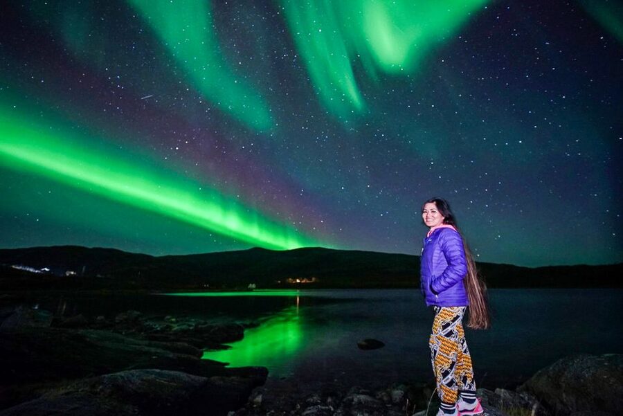 Tromsø: Northern Lights Chase Minibus Tour - Getting photographs of yourself beneath the Aurora