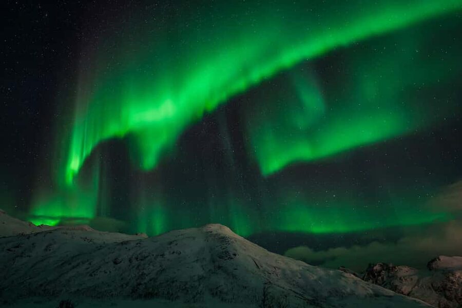 Tromsø: Northern Lights Tour with Guaranteed Sightings - Chasing clear skies toward Finland