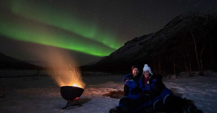 Tromsø: Private Aurora Chase with Meals, Campfire, Photos. - Local food and stories beside the fire