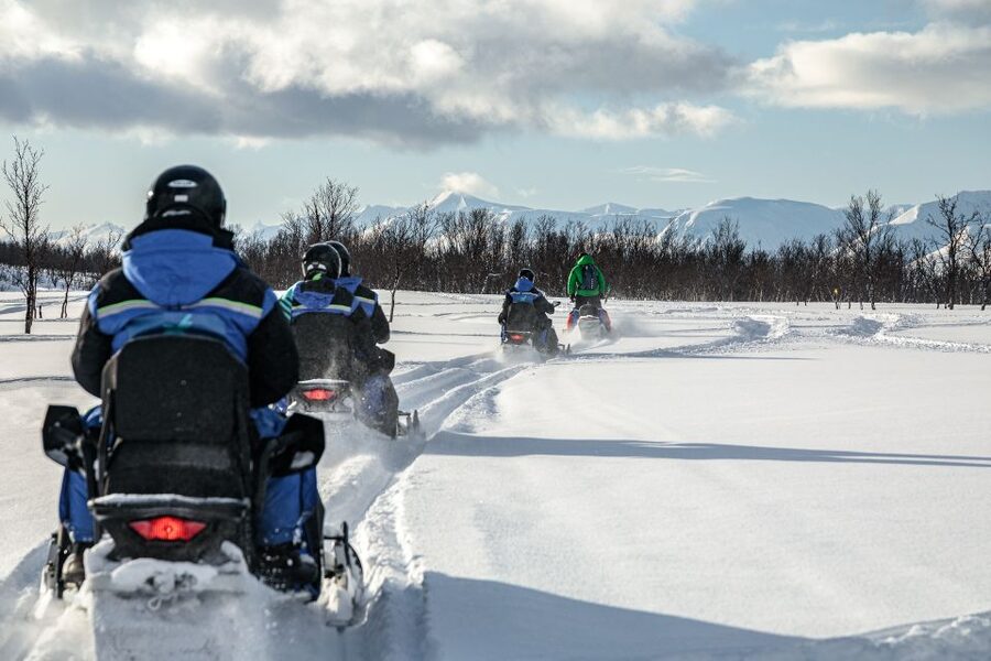 Tromsø: Scenic Arctic snowmobile safari in the Lyngen Alps - Getting dressed and ready for the ride