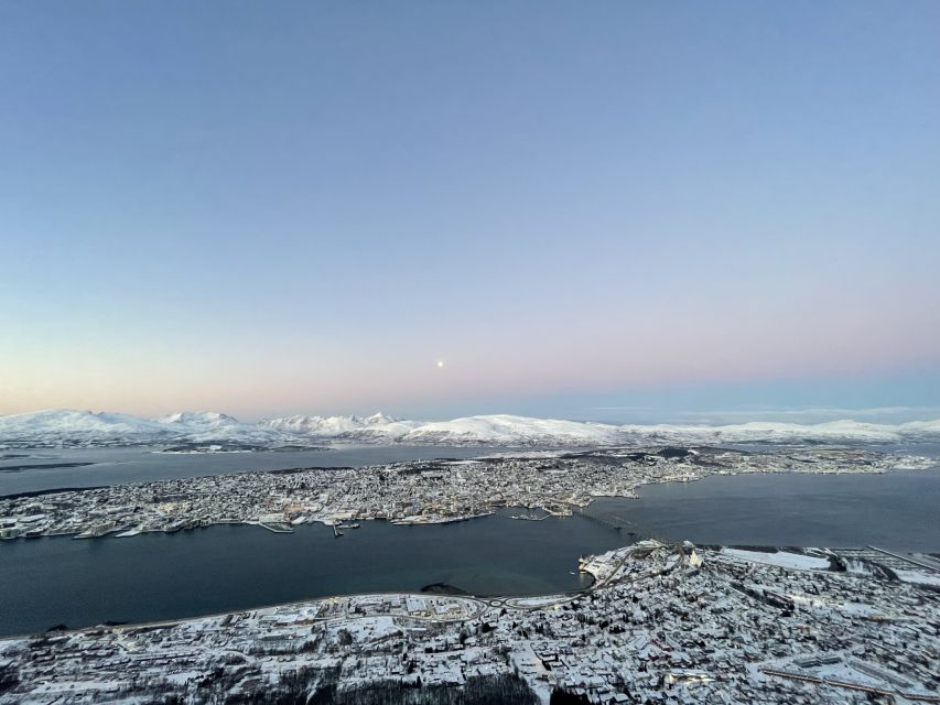Tromso: Sightseeing Cruise by Catamaran with Snacks & Drinks - Setting out beside Scandic Ishavshotell