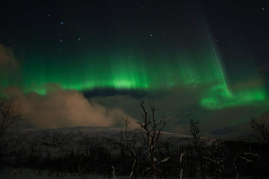 Tromsø: Small-Group Adventurous Northern Lights Hunt - Walking through snow to a frozen lake