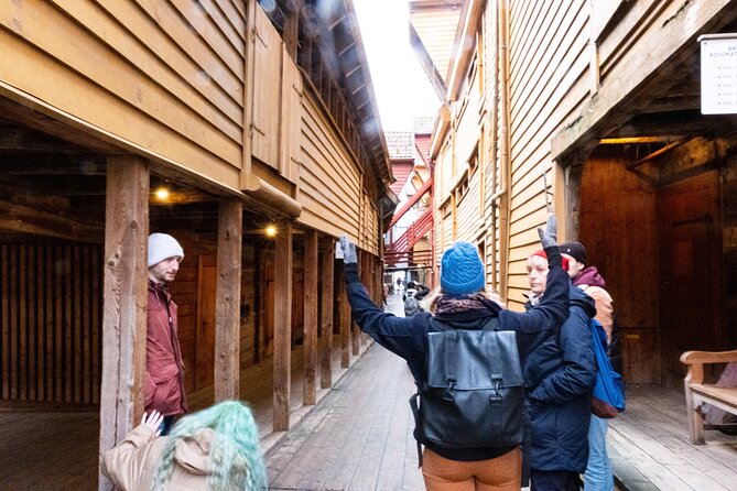 Walking Tour in Bergen of the Past and Present - Finishing by the fish market and tourist office